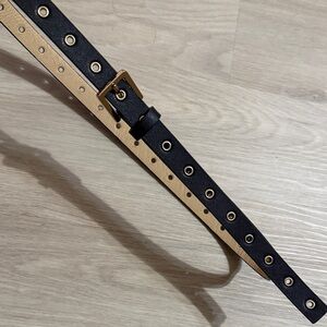 Vince Camuto Black and Tan Double-Sided Grommet Belt